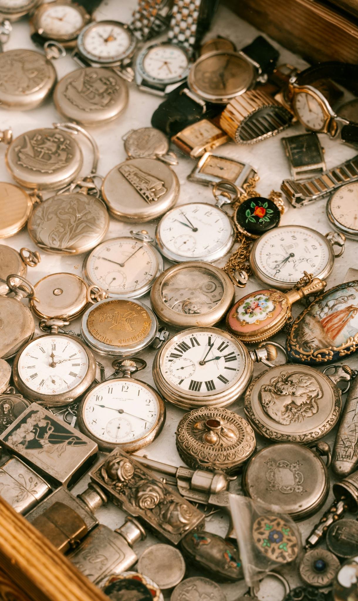 Close-up of an antique watch collection displayed at a market in Sofia, Bulgaria.